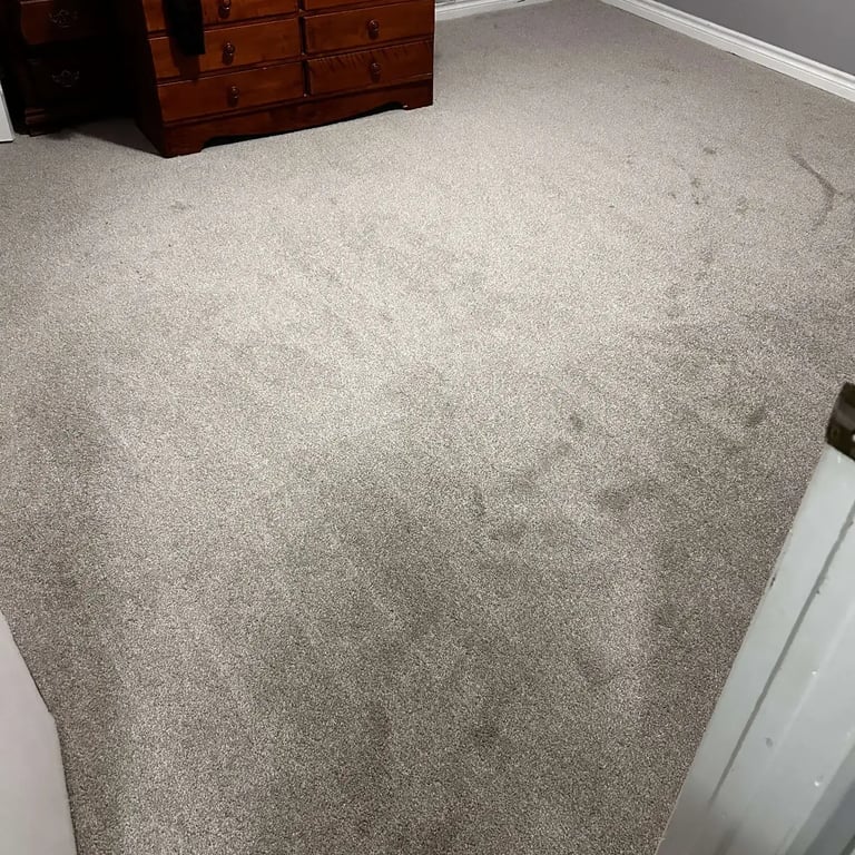 Master bedroom carpet installation in Woodstock, Ontario featuring Serenity Light Sand. A plush, neutral-toned carpet.