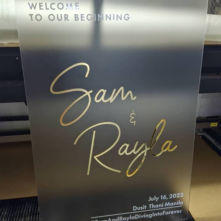 Elegant frosted acrylic wedding sign with gold script for Sam & Rayla, Dusit Thani Manila