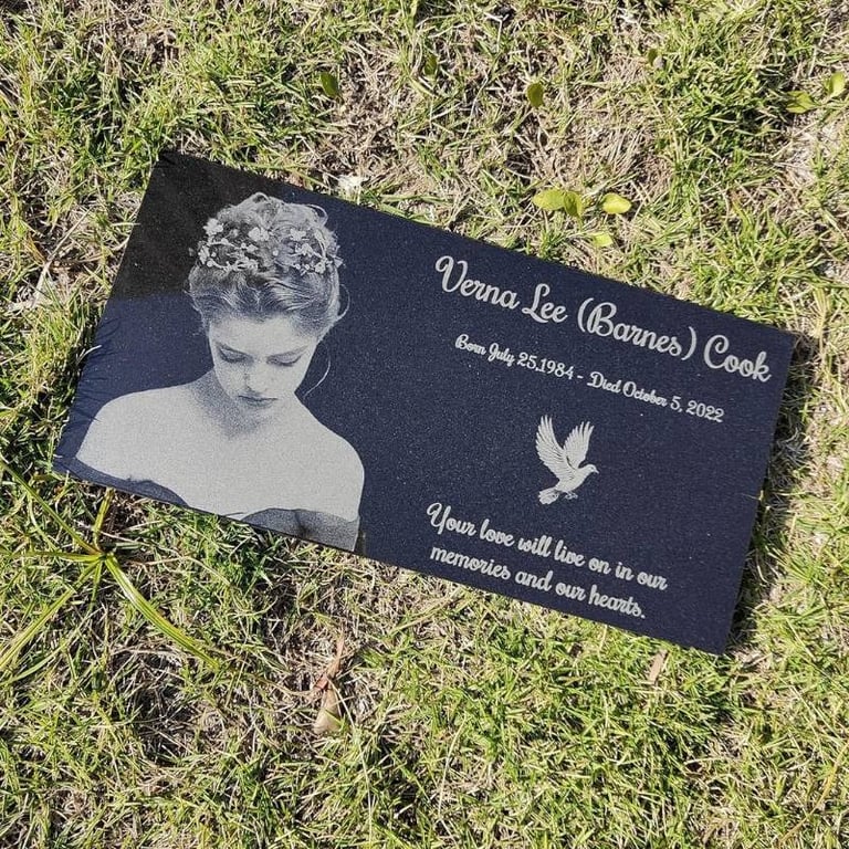 Custom lasered granite plaque for Verna Lee with a dove graphic.