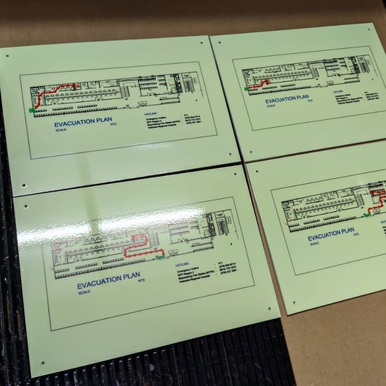 Green acrylic Evacuation Plan 4 piece showing floor plans