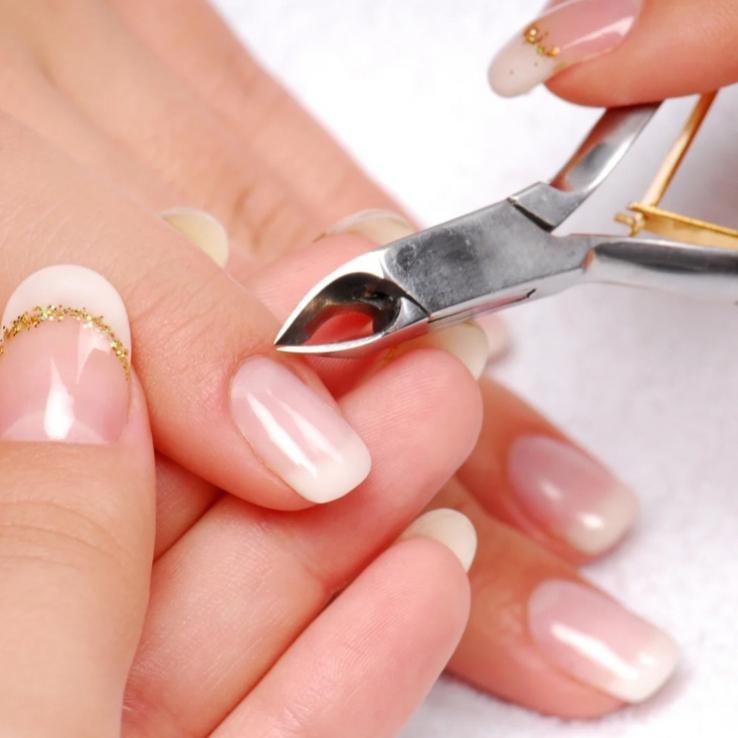 Professional manicure and pedicure treatment for clean, polished, and well-groomed nails in a spa