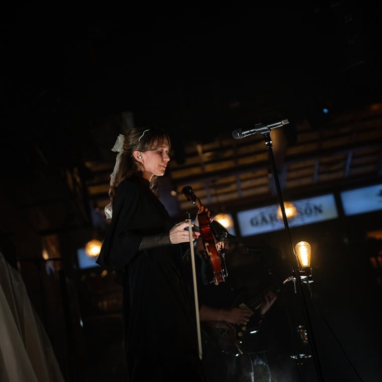 Margaux Sauvé holding a violin, Ghostly Kisses, Bla Bla Dubai | NBmore