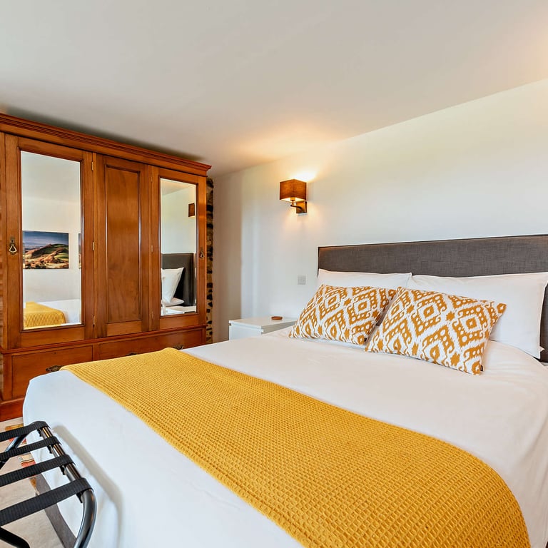 Y Cwt Mochyn – the pigsty- has a king size bed in this romantic cottage for 2.