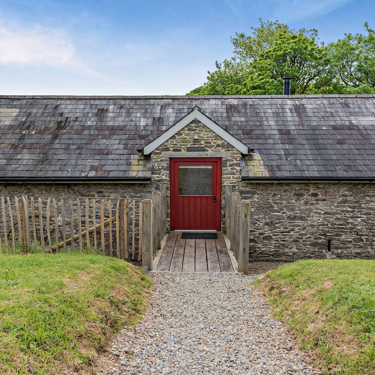 The main entrance to your staycation in South Wales is conveniently close to your dedicated parking area.