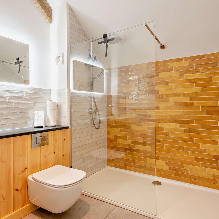 The generous walk-in deluge shower is ideal for a staycation in South Wales.