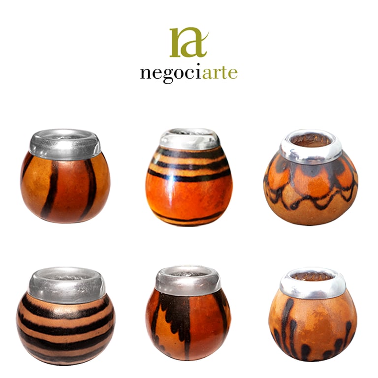 Naturally grown gourds, decorated by hand over an open fire, for drinking mate