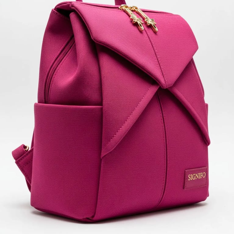 Tas ransel "Senja Merona" Signifo berwarna fuchsia dengan lipatan unik.