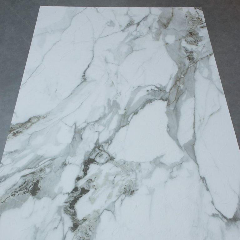Classic Calacatta with striking vein details and a smooth, polished finish