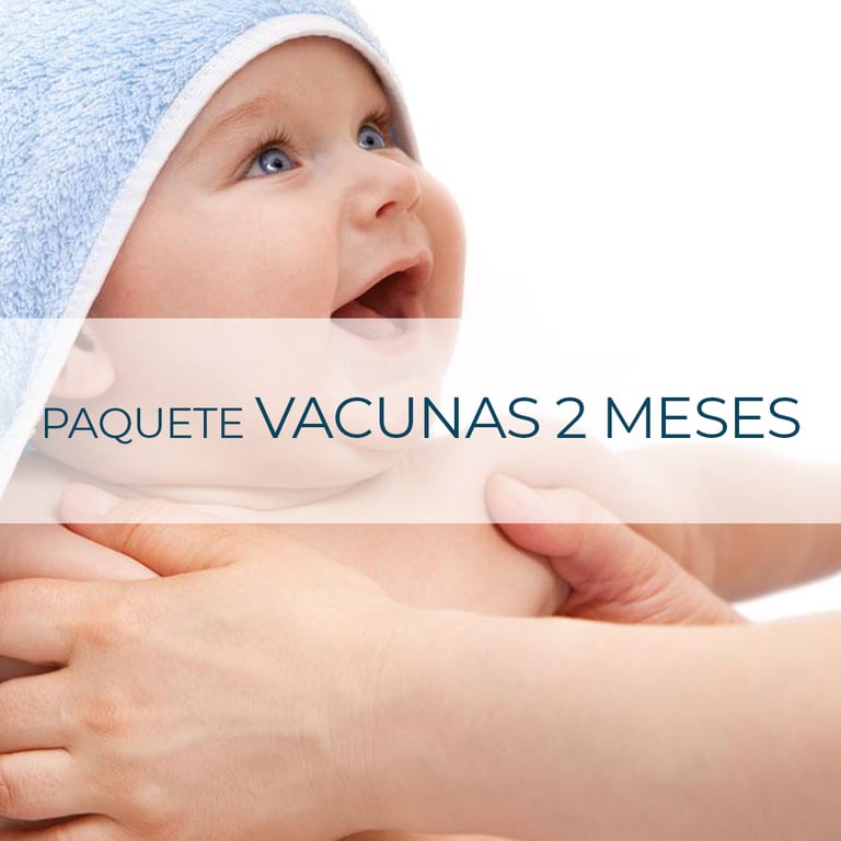 a baby in a blue towel with a woman's hand holding a baby