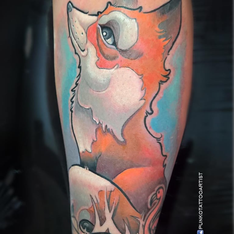 Tatuaje de un zorro a color. Pieza terminada en el brazo, realizada por **Punkotattooartist en Barcelona**.