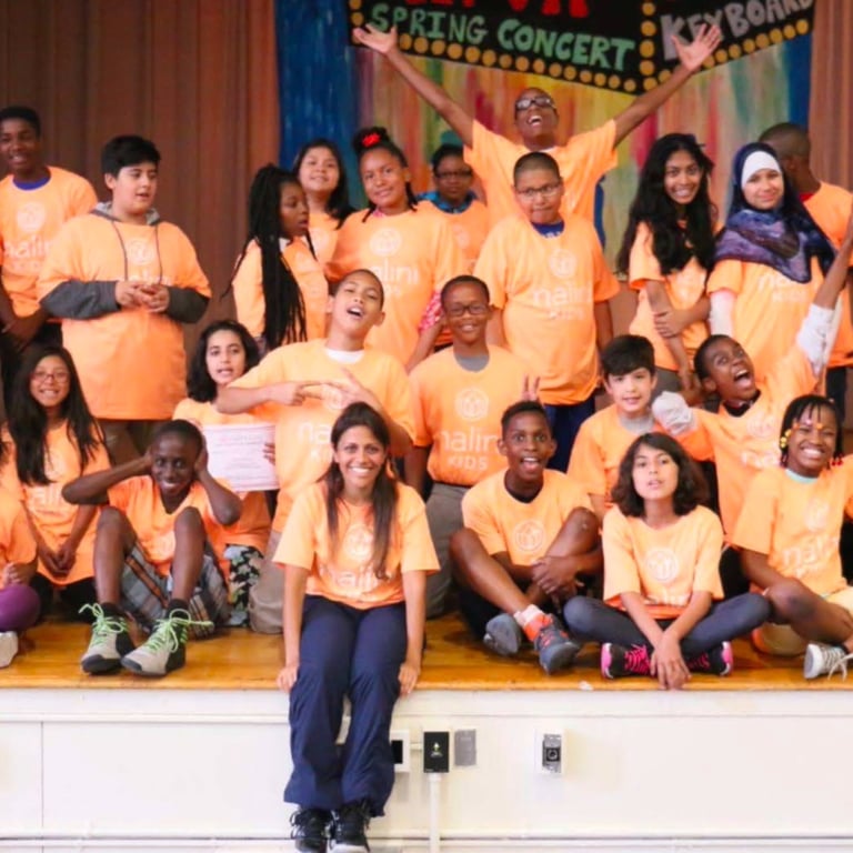Middle school students graduate NaliniKIDS.
