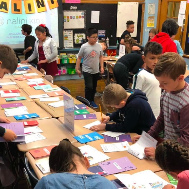 Students share their work with peers.