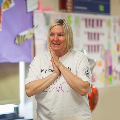 NaliniKIDS program teacher smiles.