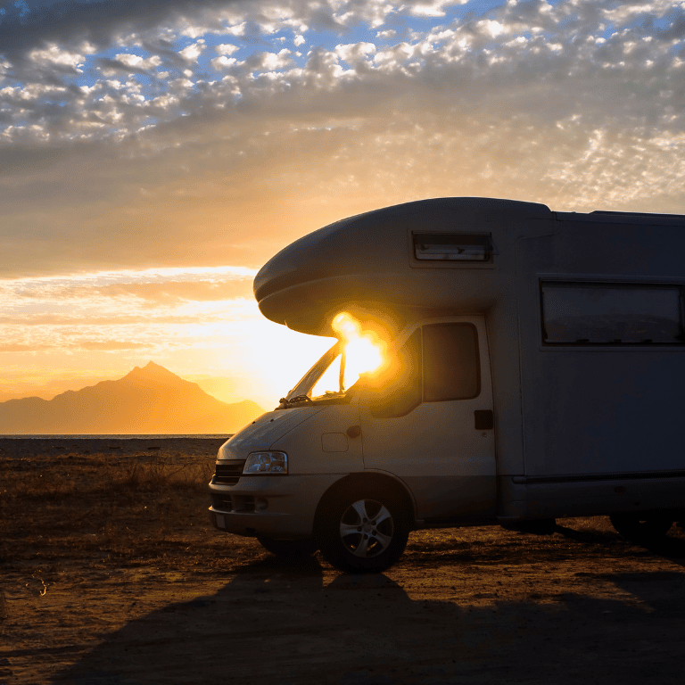 a camper van parked in the desert