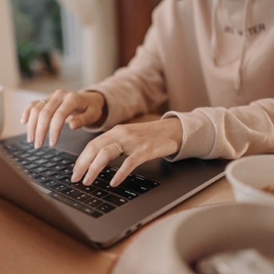 Bookkeeper using laptop