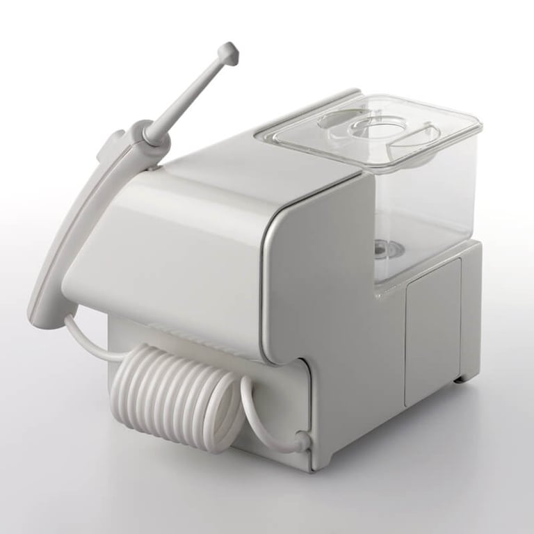 Description of the dental spray composition, reservoir, handle, nozzle and ergonomics