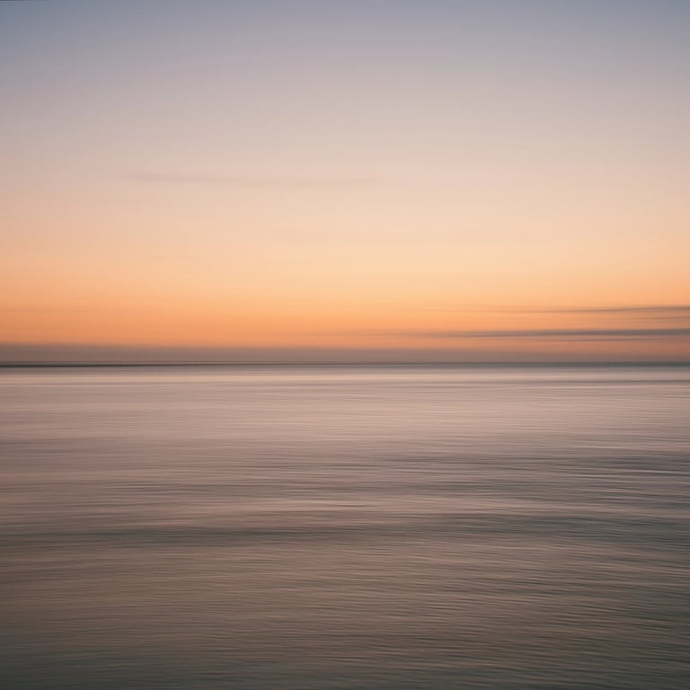 Minimalist ICM sunset over calm ocean waters with soft pastel colors in Mauritius