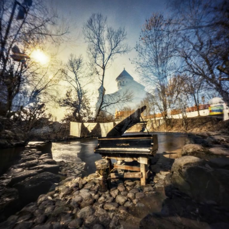 Opened piano standing near the river