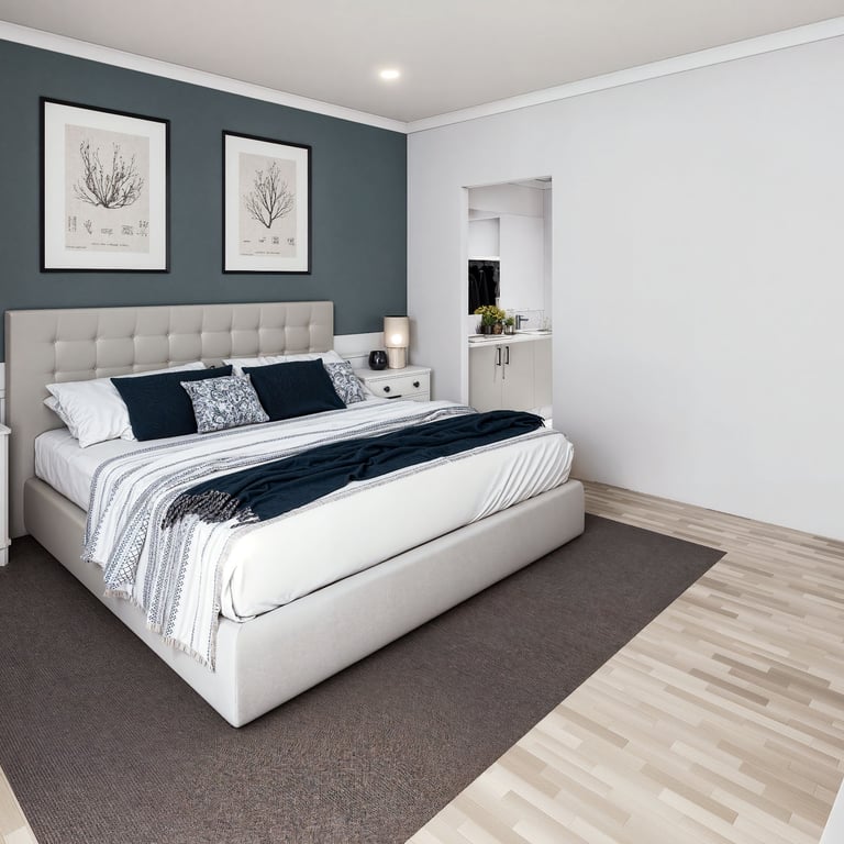 Modern bedroom with a teal accent wall, tan tufted headboard, white dressers, and light wood flooring.