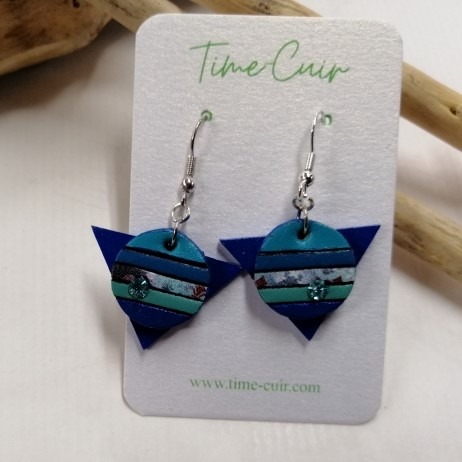 a pair of earrings with a blue and green striped design