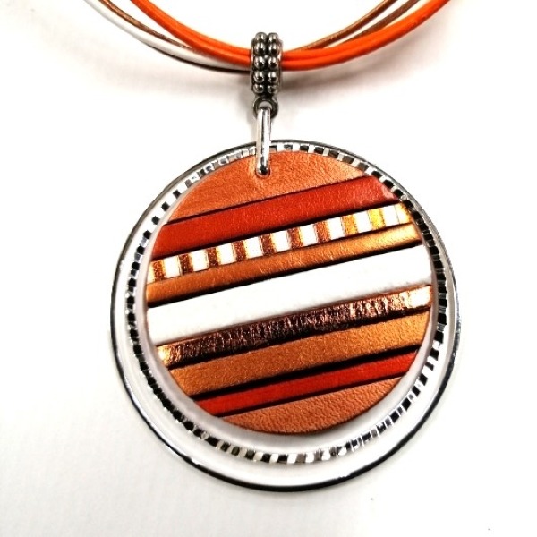 a necklace with a pendant on a cord cord cord cord