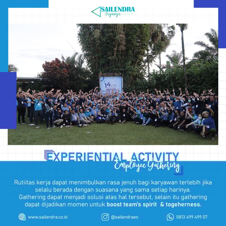 a group of people standing in front of a banner in activity employee gathering