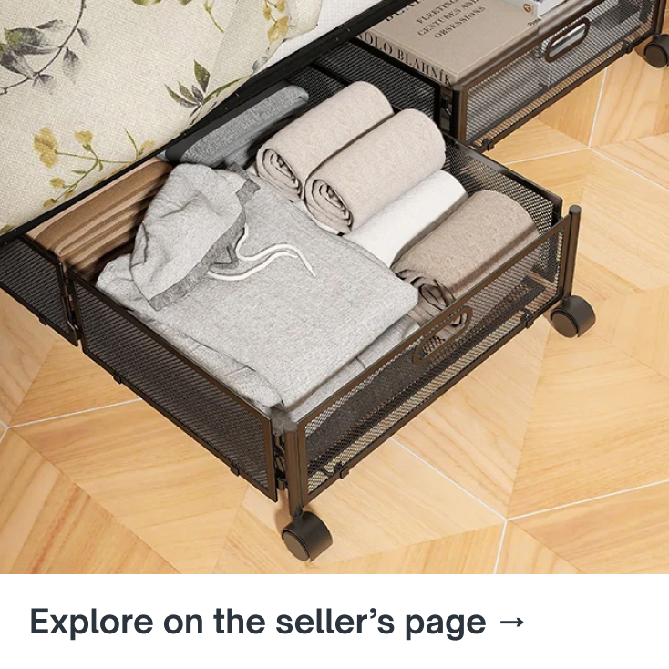 Metal under-bed storage drawer neatly filled with folded clothes and linens