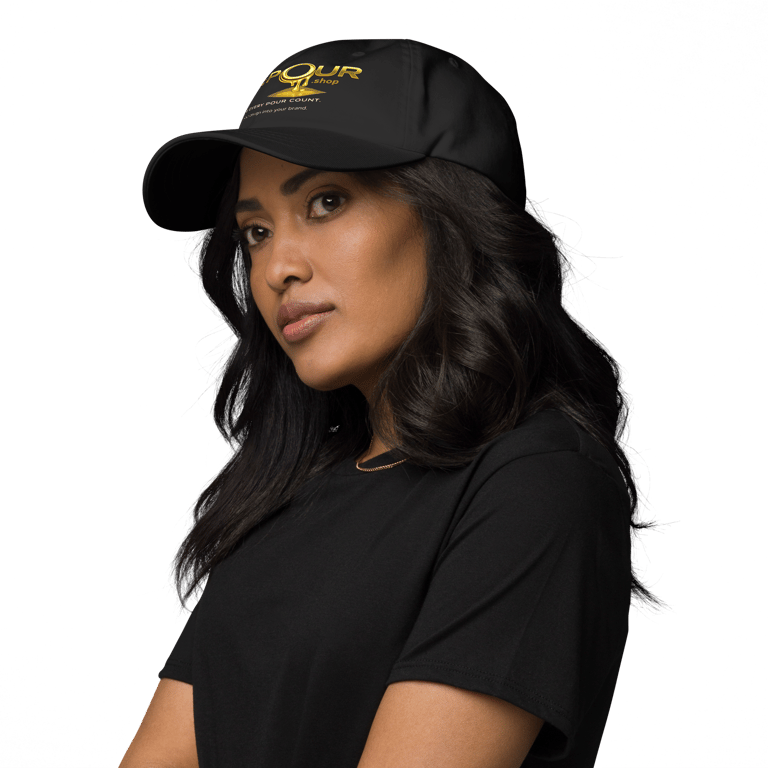 woman wearing the pour shop logo black cap portrait