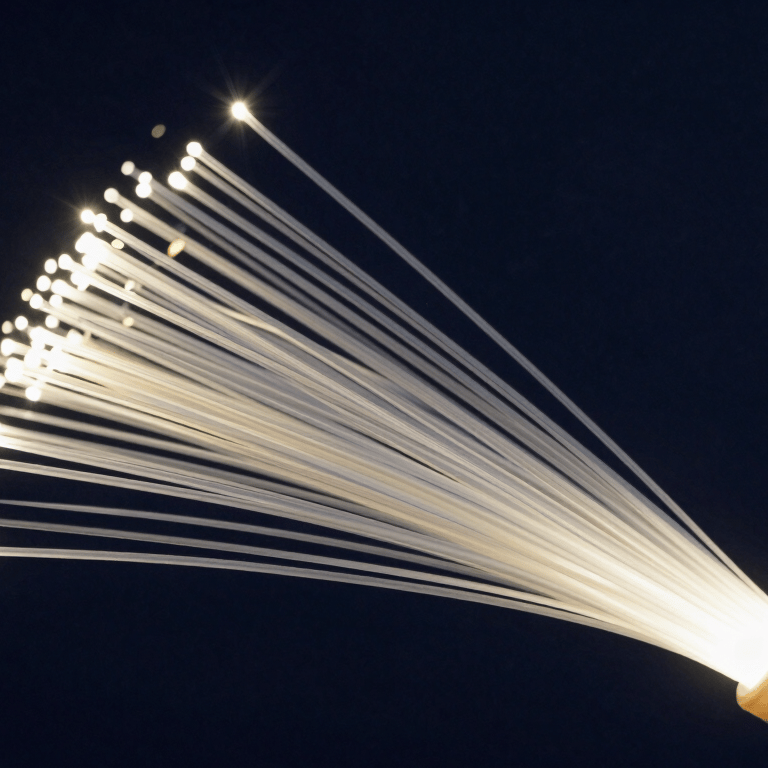 A professional in a sharp suit looking at a tablet in a modern North American / US city lobby, surrounded by Mist Grey architecture and glass.