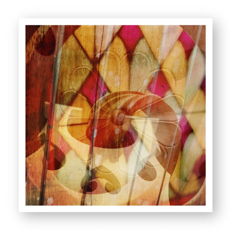 Abstract artistic print featuring colorful harlequin patterns and spiral shapes on a rustic wood texture.