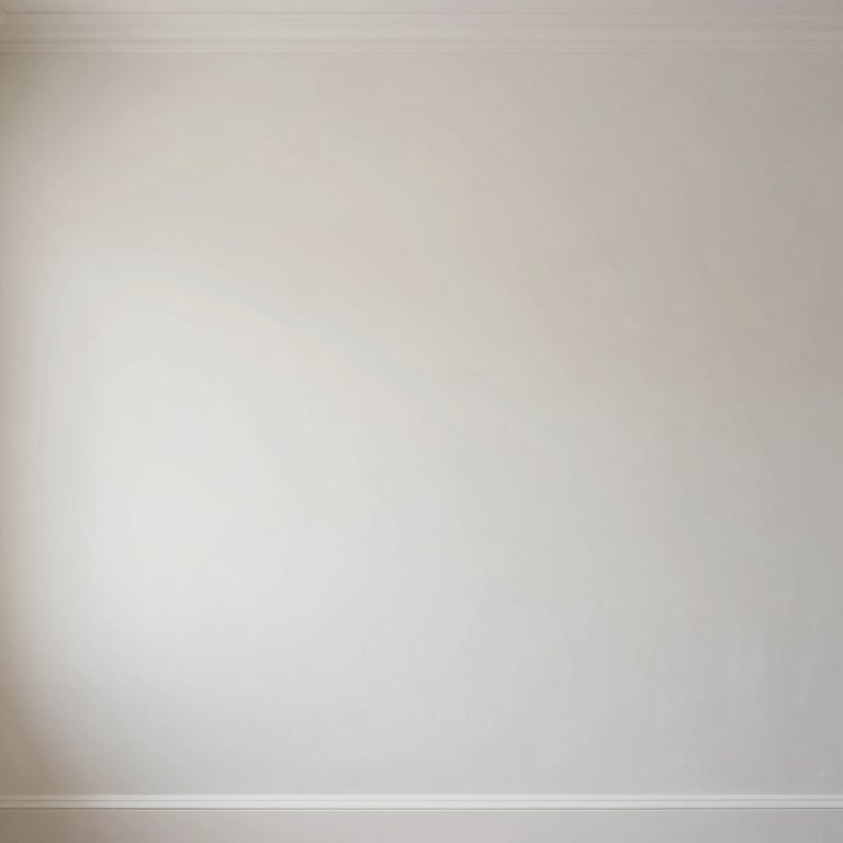 A professionally painted interior wall showcasing a smooth finish in off-white tones.