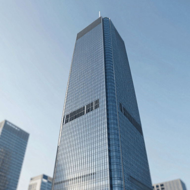 A wide shot of a modern glass office building reflecting a clear sky, symbolizing transparency and growth, using brand colors #1A2E44 and #3C6B94.