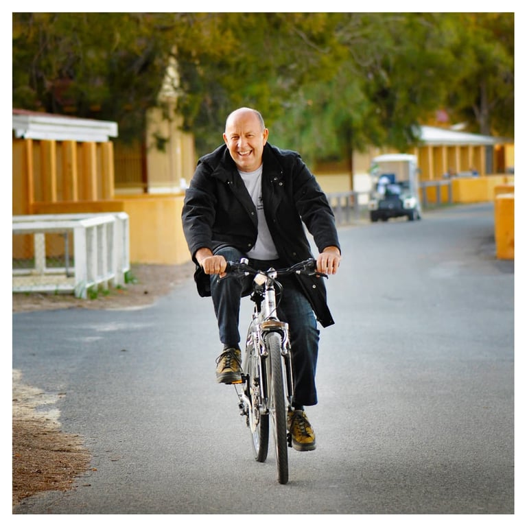 Geoff Fisher riding a bike at Rottnest