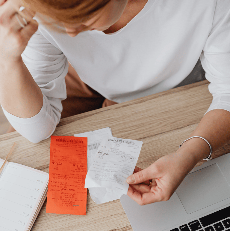 business-women-stressing-over-receipts-and-bookeeping