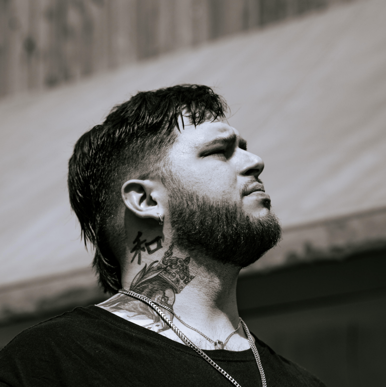 Savage Banks looking right toward the horizon, shoulders-up portrait.