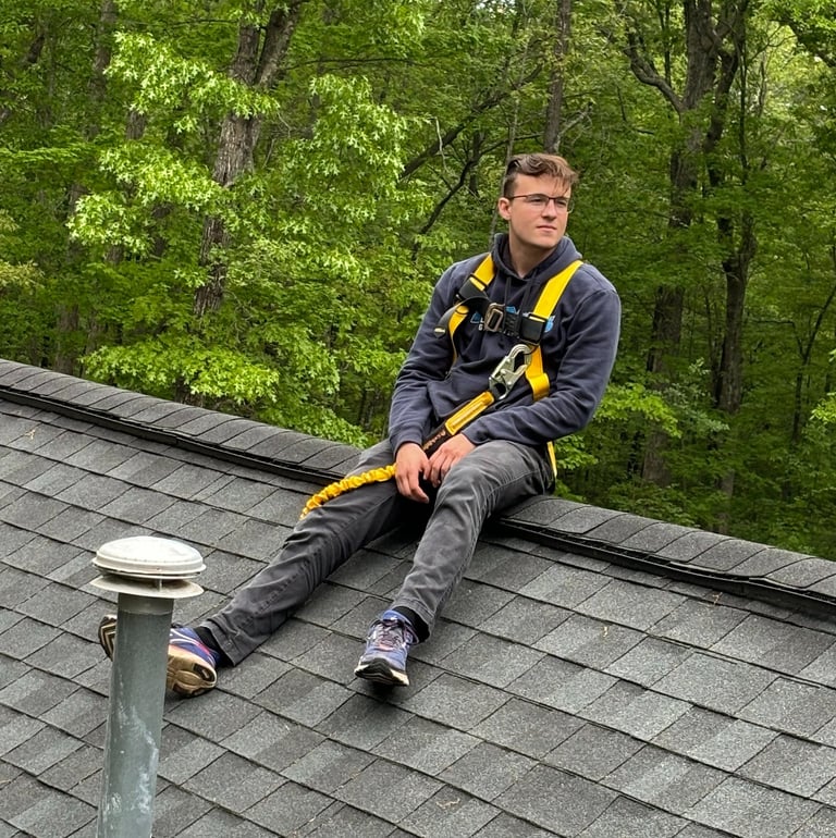 keegan mcgrath sitting on roof