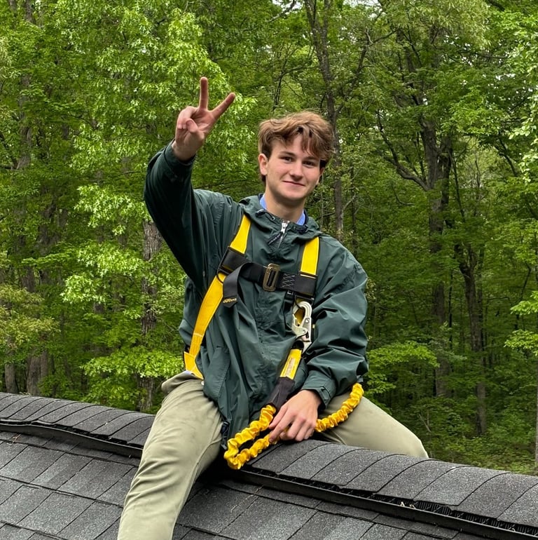 kyan sapko sitting on roof