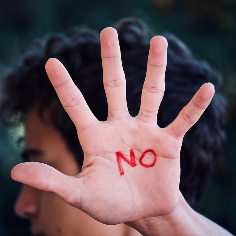 A palm written "No" on it Direct communication