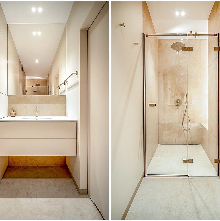 Nowoczesna łazienka: po lewej umywalka z szafką i lustrem, po prawej przeszklona kabina prysznicowa.