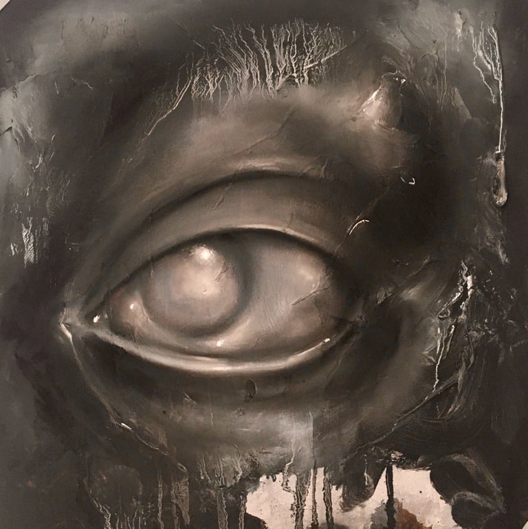 eye with milky lens. Black painting with white chalk which has picked out textures on the surface.