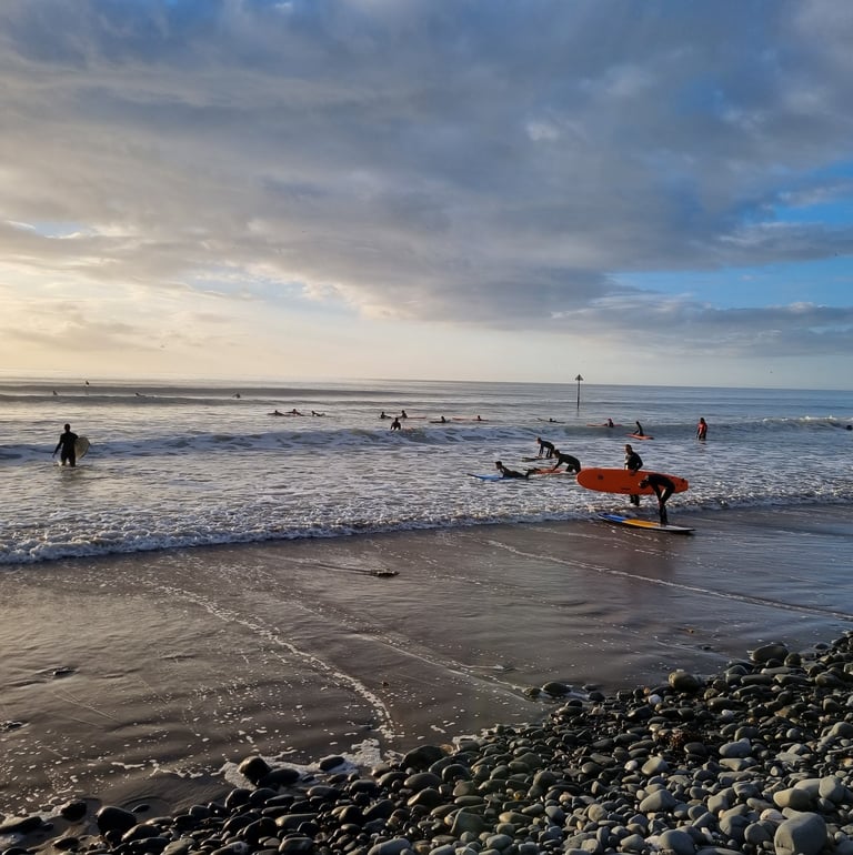 A busy surf lesson in the sunshine at Ynyslas