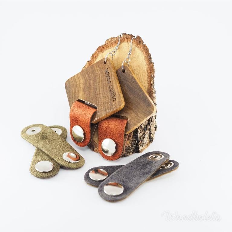 wooden earrings with 3 pairs of fabric pendants, hanging on wooden stand