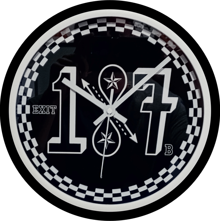 Custom black and white quartz wall clock featuring Exit 187 B logo and a checkered bezel.