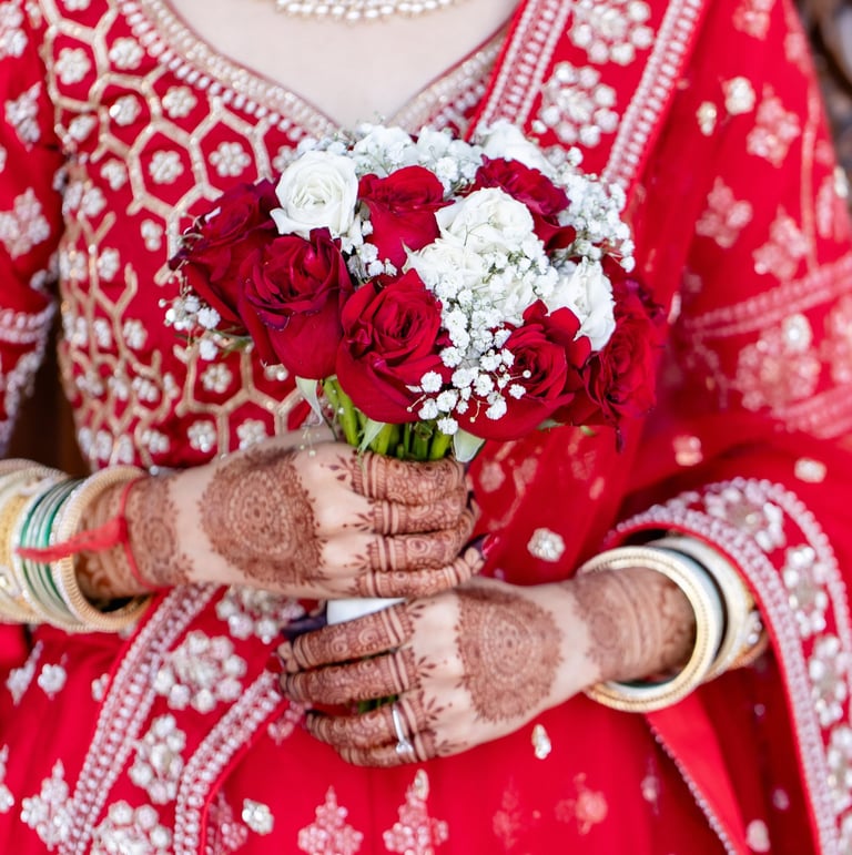 Beautiful Bride is Holding Flower in Hand