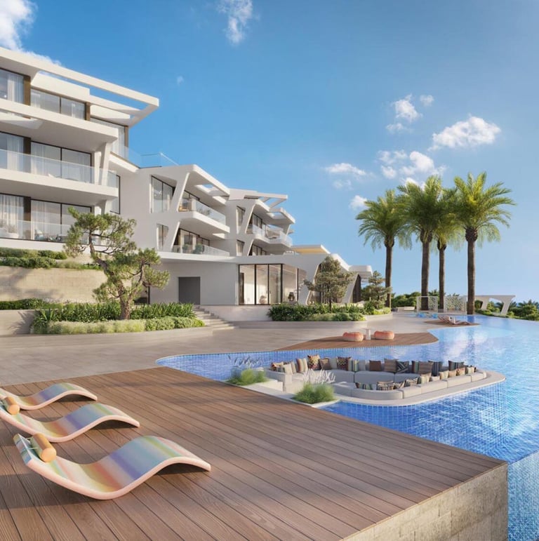 Luxury modern villa with an infinity pool, sun loungers, and ocean views under a blue sky.