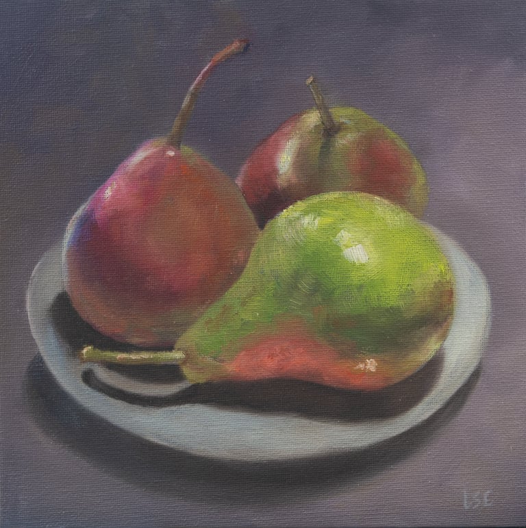 An original oil painting of three pears on a plate