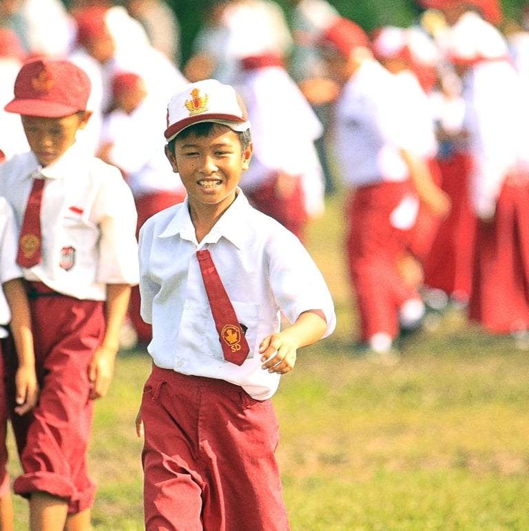 a group of young children in uniform uniforms