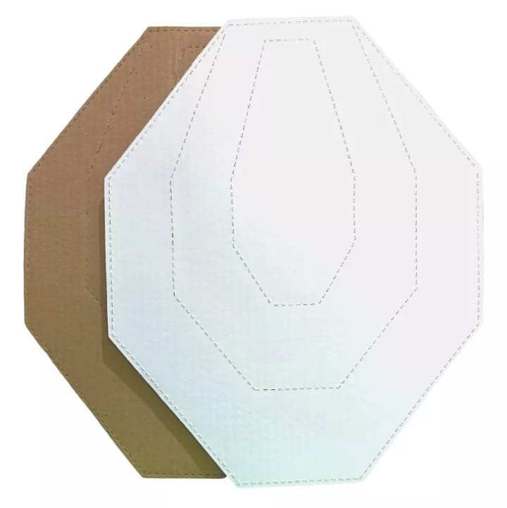 Um recorte de papel branco e marrom em formato de hexágono.