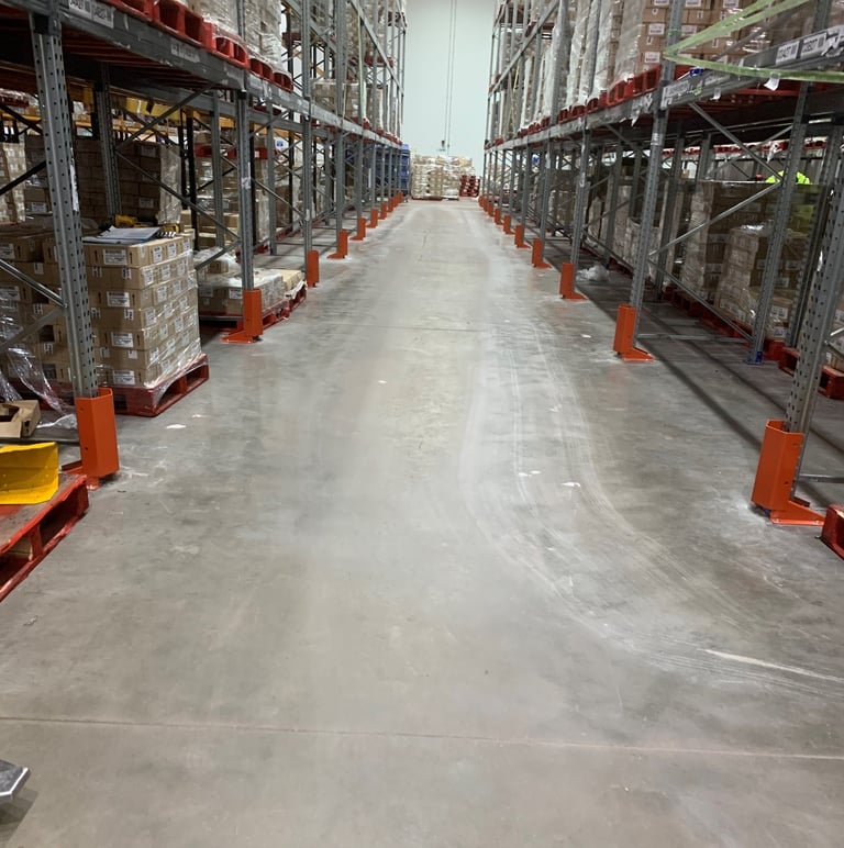 upright protectors fitted in food manufacturing warehouse