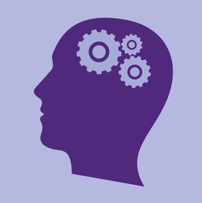 Silueta de una cabeza con tres engranajes